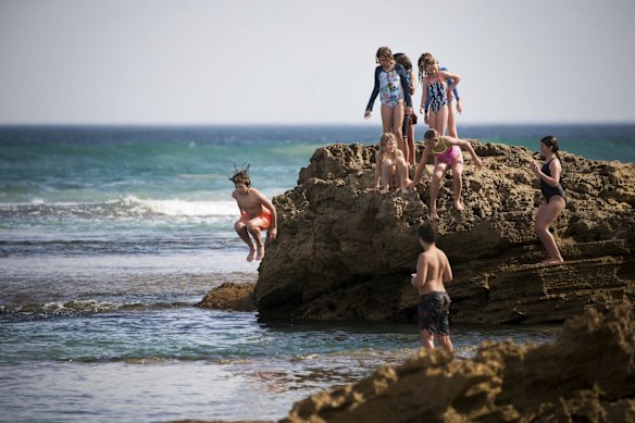 Kids having fun in the sun at Sorrento Ocean Beach