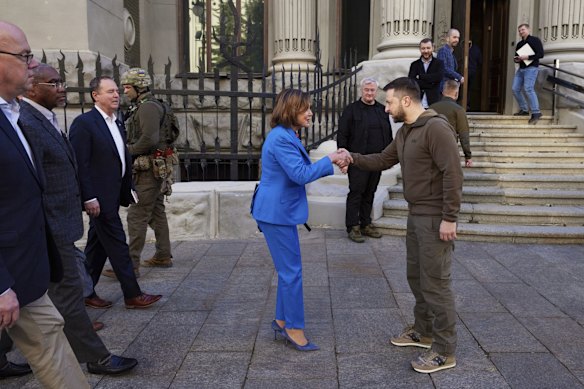 Ukrainian President Volodymyr Zelensky and US Speaker of the House Nancy Pelosi shake hands during their meeting in Kyiv on Sunday, May 1. 