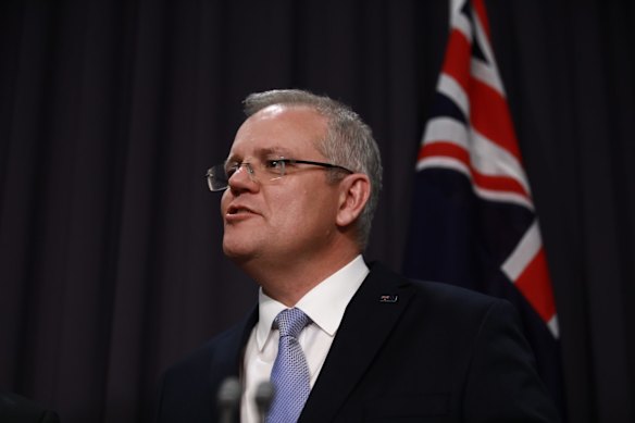 Incoming Prime Minister Scott Morrison and newly elect deputy leader of the liberal party Josh Frydenberg speak to the media after a leadership spill at Parliament House in Canberra.