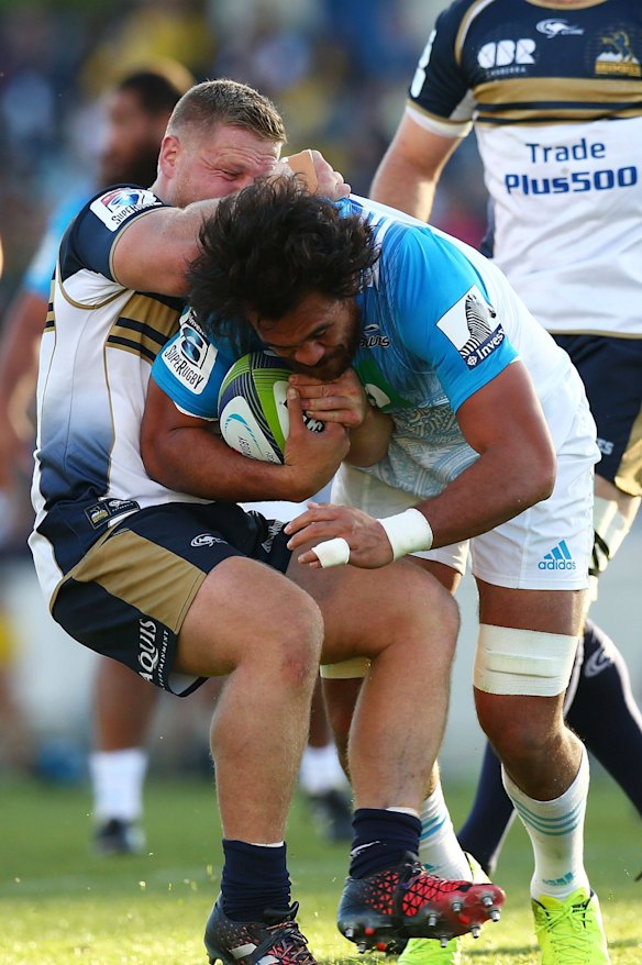 Steven Luatua of the Blues is tackled during the round 10 Super Rugby match between the Brumbies and the Blues.
