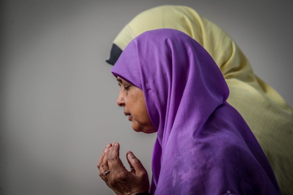 Meherun Nisa prays at Gungahlin Mosque on Saturday, the day after terrorist attacks at mosques in New Zealand.