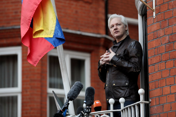 Julian Assange speaks to the media from the balcony of the Ecuadorian embassy in May 2017.