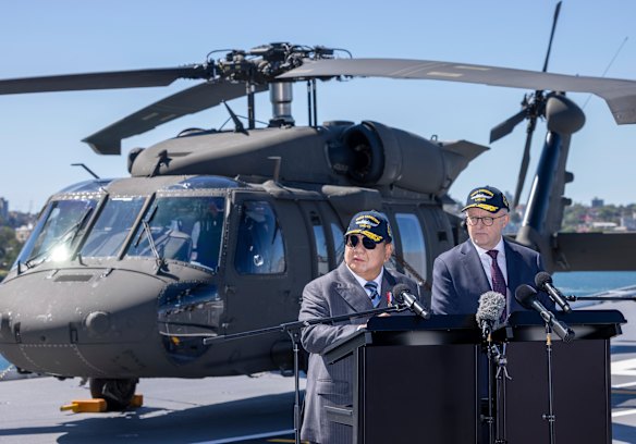 Indonesian President Prabowo Subianto and Prime Minister Anthony Albanese on the flight deck of HMAS Canberra in Sydney, where they announced a defence pact.