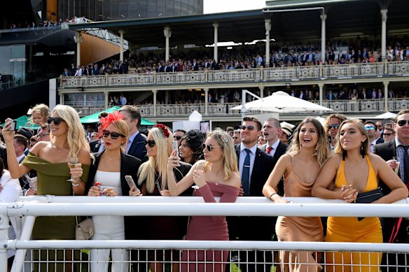 Racegoers watch on during The Everest.