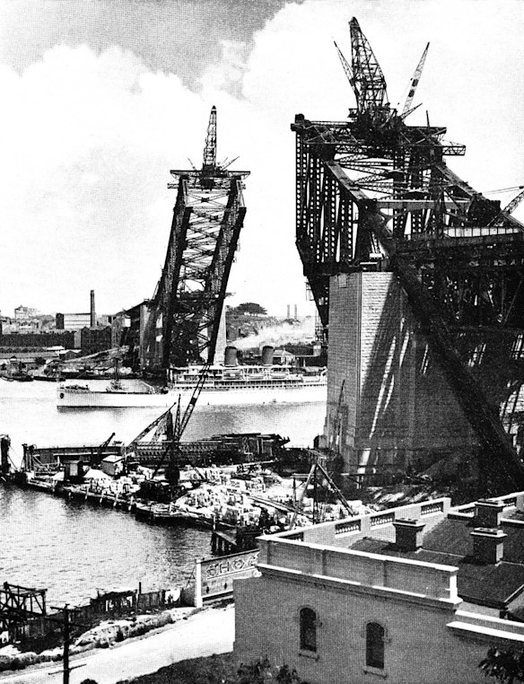 The great arch of the Sydney Harbour Bridge during construction. It was completed in 1932.
