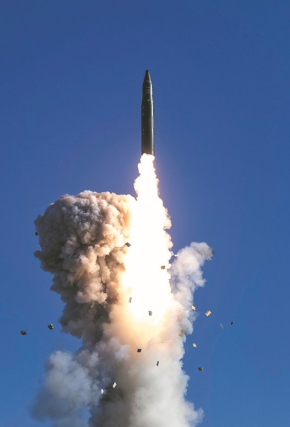 An image released by the Chinese military showing the launch of an intercontinental ballistic missile carrying a dummy warhead on September 25, 2024.