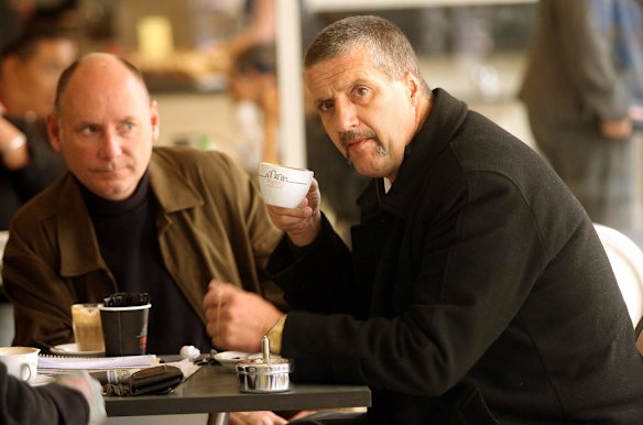 Mark Chopper Read with  his manager.