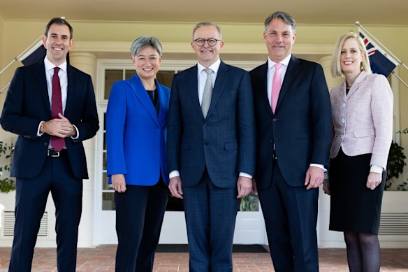 Treasurer Jim Chalmers, Minister for Foreign Affairs Penny Wong, Prime Minister Anthony Albanese, Deputy Prime Minister Richard Marles and Finance Minister Katy Gallagher pose after the ceremony.