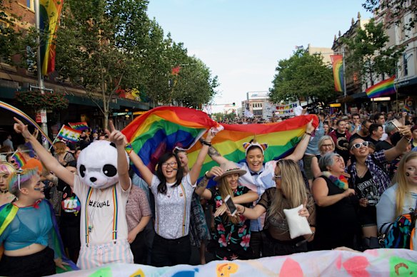 Celebrations continue as people rally down Oxford st, Darlinghurst.