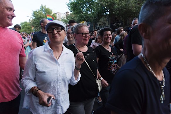 Crowds march down Oxford St, Darlinghurst this evening to celebrate the majority yes vote of the results of the postal vote.