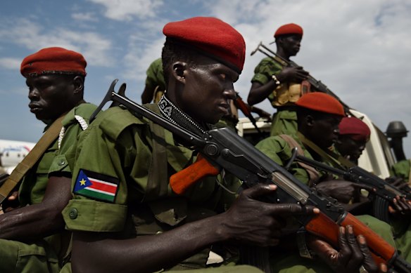 SPLA-IO soldiers provide security for the SPLA-IO Chief of General Staff Simon Gatwech Dual as he arrives in Juba, South Sudan, an important step in the peace process.