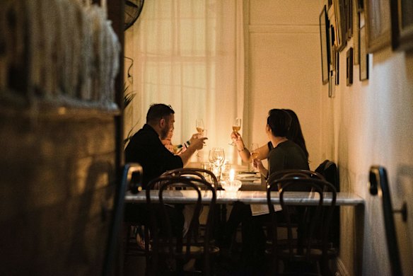 A group of dinners celebrate the first night of eased coronavirus lockdown restrictions in Enmore. 