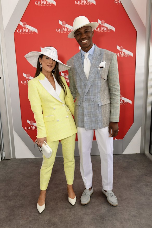 Effie Kats and Shayne Tino at the Mumm marquee in the Birdcage on Oaks Day 2018.