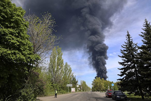 Smoke rises from an oil depot after missiles struck the facility in an area controlled by Russian-backed separatist forces in Makiivka, 15 kilometres east of Donetsk. 