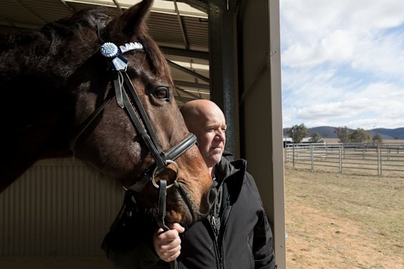 Retired serviceman Max Streeter, who suffers from PTSD, interacts with Vashka, a retired racing horse, as part of a equine therapy program run by Racing NSW in Capertee, NSW.