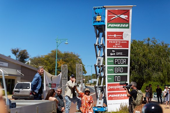 A protest against a proposed development of a Puma petrol station in the Dunsborough CBD. Protestors rally against a proposed 24-hour Puma petrol station in Dunsborough.