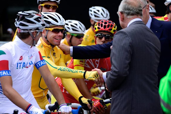 Prince Charles meets Cadel Evans at the start of the mens road race on Pall Mall in London.   Photo by Jason South