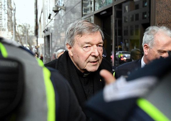 Cardinal George Pell arrives at Melbourne Magistrates Court.
