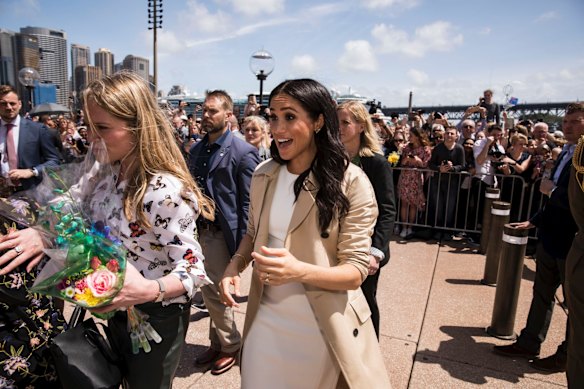 The Duke and Duchess Harry and Meghan meet the crowd outside the Opera House in Sydney on October 16, 2018. 