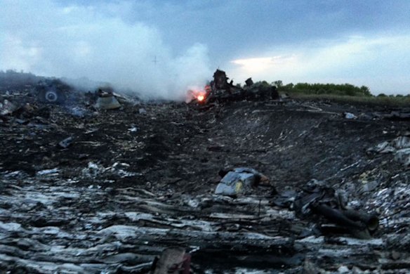 Ssmoke and wreckage of the malaysian airliner carrying 295 people from Amsterdam to Kuala Lumpur after it crashed, in rebel-held east Ukraine.