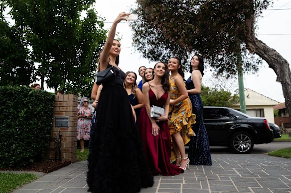 Girls from Our Lady of Mercy College in Parramatta held a pre-formal gathering with their parents prior to their school formal. Students pre-emptively mourned the loss of formals in term three then 200 school captains joined forces in August to launch a COVID-safe formal campaign, and the government gave them the green light in September. 