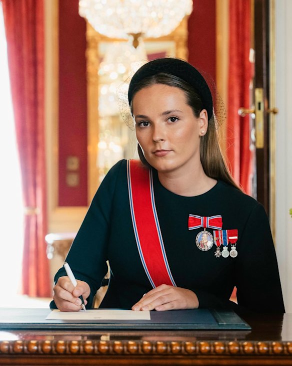 Ingrid Alexandra signs an oath of allegiance at the Royal Palace, allowing her to serve as regent.