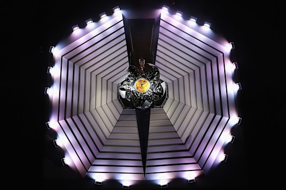 Lighting the Olympic cauldron.