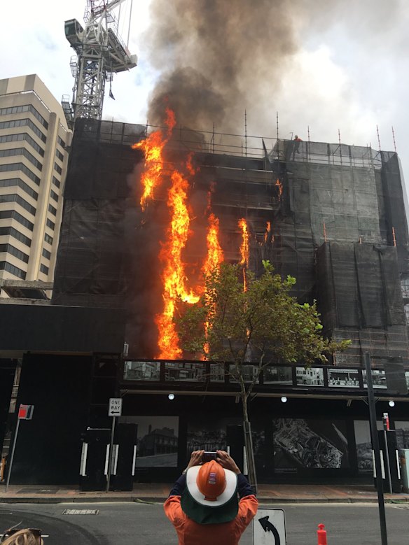 More than 60 firefighters battled the blaze at the building site in Circular Quay.