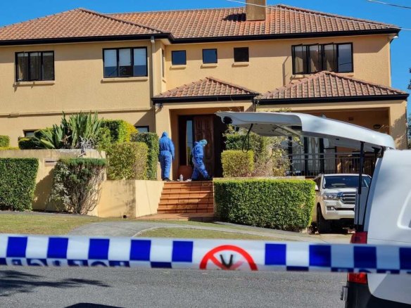 Detectives and forensic officers at the Kefu family’s Brisbane home.