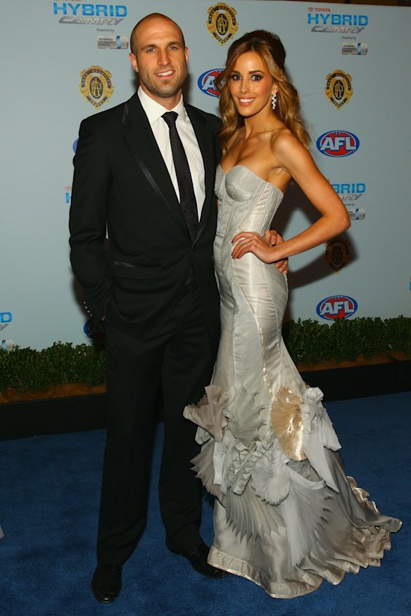 Chris Judd and Rebecca Twigley arrive at the 2010 Brownlow Medal. Bec wore an Aurelio Costarella gown.