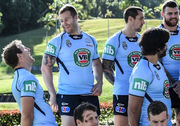 Ryan Hoffman and Trent Merrin share a joke.