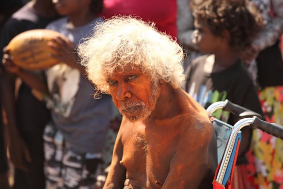 July 19th 2011,  Covered in Ochre for ceremony, Chief law man Jacob Nayinggul supervises proceedings as human remains are finally reurned to their ancestral home in Gunbalanya for reburial after over 60 years in the posession of the Smithsonian Institution after being collected during a combined Australian and American expedition to Arnhem Land in 1948.