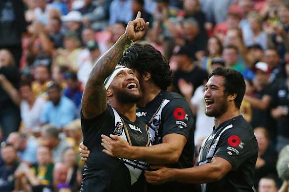 Manu Vatuvei of New Zealand celebrates scoring a try. 