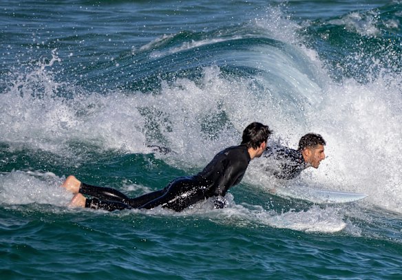 Surfers at Bondi Beach.