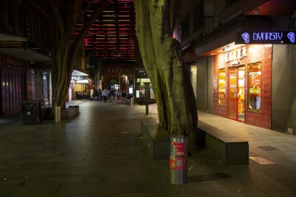 The main walkway through Chinatown is virtually empty.