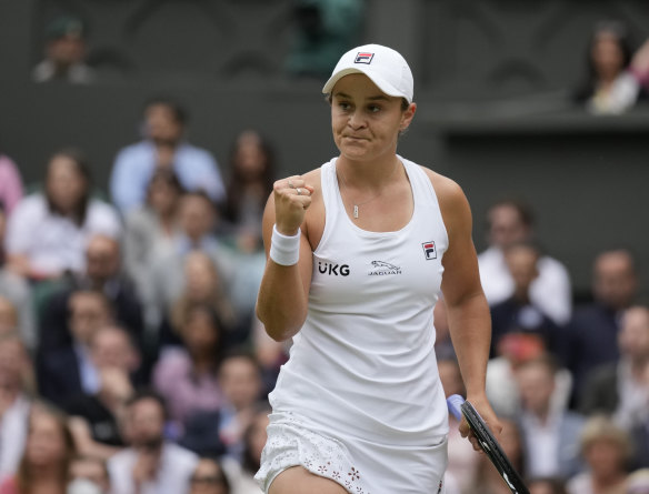 Ash Barty celebrates after winning the Wimbledon final. 