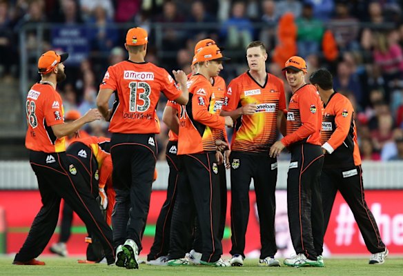 Jason Behrendorff of the Scorchers celebrates taking the wicket of Riki Wessels of the Sixers.