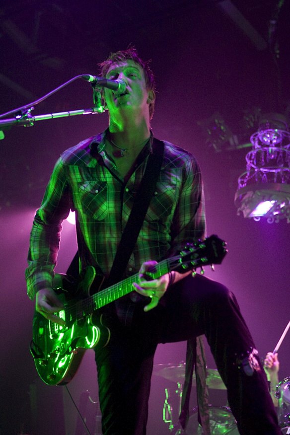 Josh Homme, lead singer and guitarist of US rock band Queens of the Stone Age, performs in 2008. 