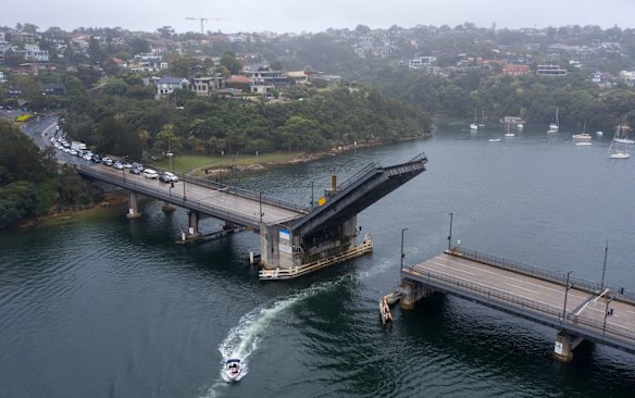 A drone photo shows the Spit Bridge being raised on saturday afternoon before the area to the north of the bridge went into lockdown at 5pm.