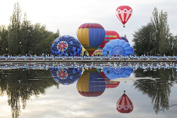 Balloons inflating on the front lawns of Old Parliament House for the Canberra Balloon Spectacular festival.