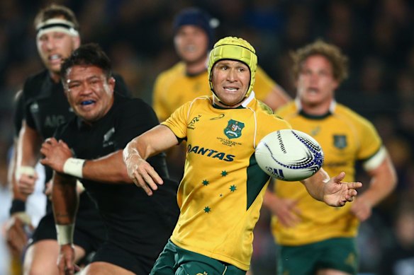 Matt Giteau tries to make something happen.