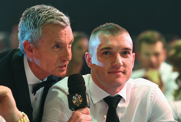 Dustin Martin, seen here with broadcasting great Bruce McAvaney, has largely been a media recluse through his stellar career.