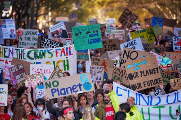 An estimated crowd of five thousand gathered at Treasury Gardens on Friday for Climate Strike, a rally and march organised by School Strike 4 Climate after the recent federal budget announcement. 