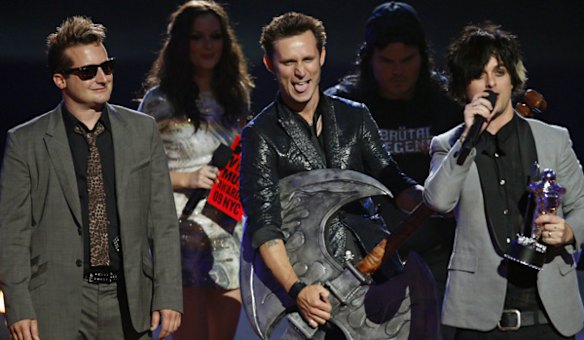 Green Day band members accept the award for best rock video for "21 Guns" at the 2009 MTV Video Music Awards in New York.