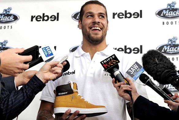 Buddy is less media shy when promoting his own products. Here he launches his new range of "Buddy" Boots.