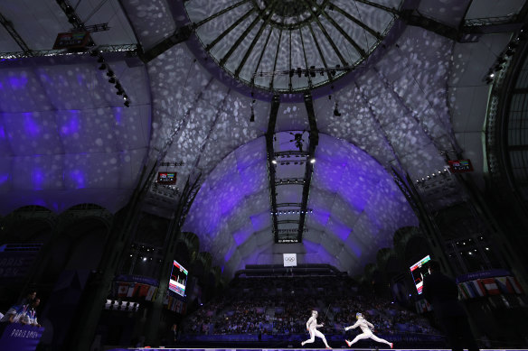 The domed ceiling above Paris’ Grand Palais provided a stunning backdrop for Olympic fencing.