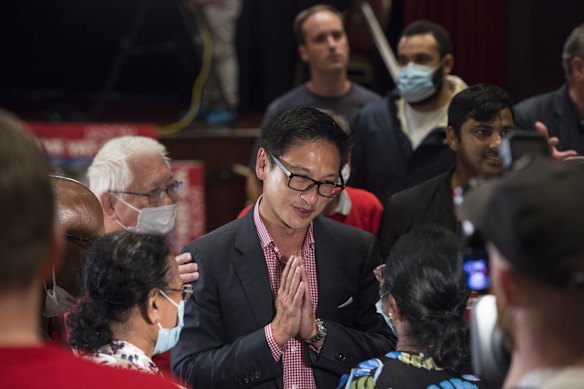 Labor candidate for Strathfield Jason Yat-sen Li celebrates a likely victory.