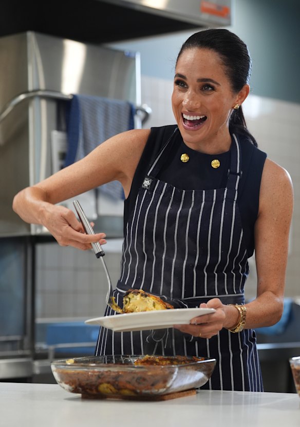 Meghan serves lunch at McAuley.