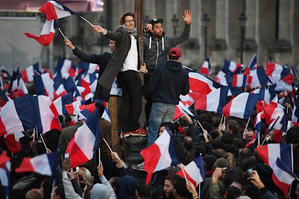 Supporters arrive ahead of Emmanuel Macron's Electoral Evening at The Louvre on May 7, 2017 in Paris, France.?Voters are going to choose their next president after a tightly fought and somewhat unpredictable campaign.? (Photo by Jeff J Mitchell/Getty Images)