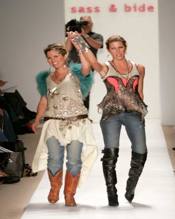 Sarah-Jane Clarke and Heidi Middleton take a bow at the end of their NYFW Spring 2005 show in 2004.